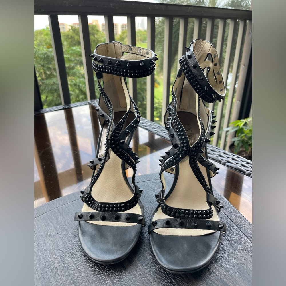 Michael Kors black heels. Very stylish. Size: 8.5